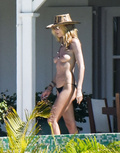Heidi Klum topless in St. Bart's (January 2015)