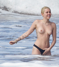 Miley Cyrus topless on Hawaii (01/2015)