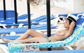 Roxanne Pallett topless sunbath (Cyprus, 09/28/2017)
