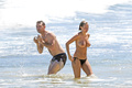 Lara Bingle sunbathing topless in Hawaii (8/2014), p. 2