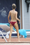 Joanna Krupa - sunbathing topless, Miami (May 2013)