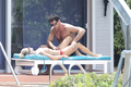 Joanna Krupa - sunbathing topless, Miami (May 2013)