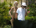 Claudia Schiffer - topless sunbathing (2002)