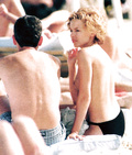Kylie Minogue - sunbathing topless (11/1998)