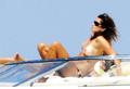 Cindy Crawford - sunbathing topless in Sardinia(8/2008)