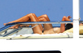 Cindy Crawford - sunbathing topless in Sardinia(8/2008)