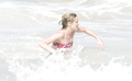 Kirsten Dunst - bikini slip in St. Bart’s (1/2005)