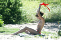 Rebecca Gayheart - topless on the beach (12/2003)