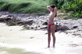 Rebecca Gayheart - topless on the beach (12/2003)