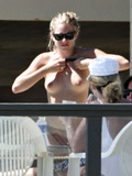 Sienna Miller - topless on the beach (4/2008)