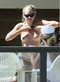 Sienna Miller - topless on the beach (4/2008)