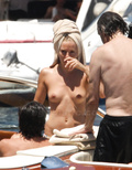 Sienna Miller - topless on yacht (7/2008)