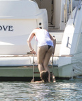 Selena Gomez wearing a bikini on a boat