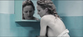 Polish actress Julia Kijowska nude in a bathtub