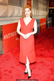 Redhead Jessica Chastain in red dress at red carpet