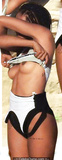 Berta Vazquez topless on a beach