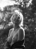 Blonde Becca Hiller nude tits in nature